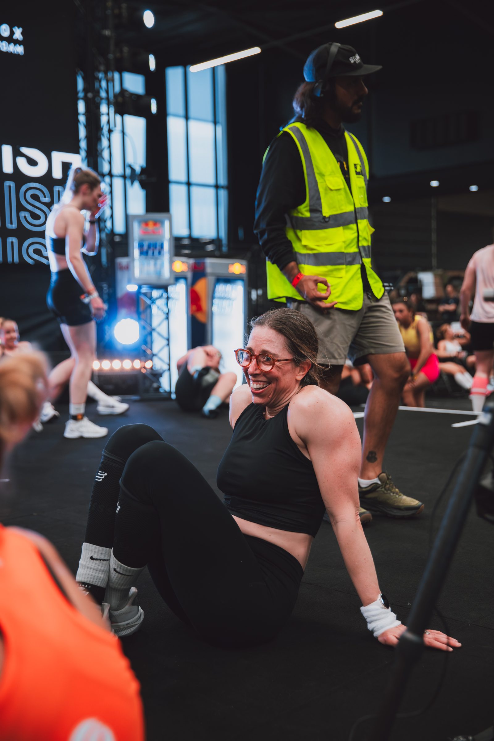 Collapsed on the floor after the finish, laughing through it.