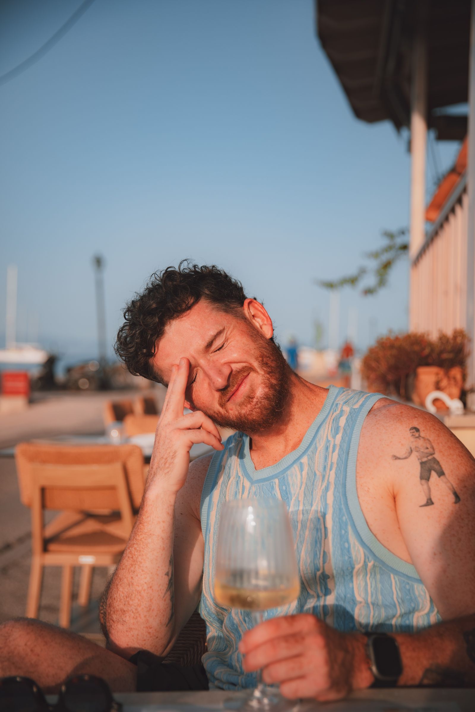 Golden-hour giggles over a glass of wine on the harbourfront.